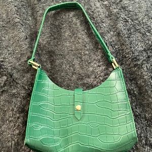 Green snake skin purse.